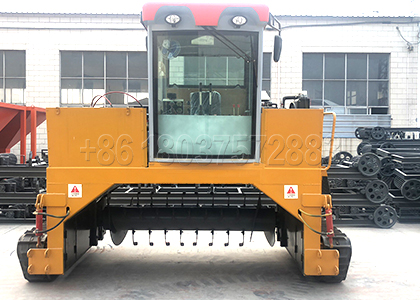 Mulch windrow turner